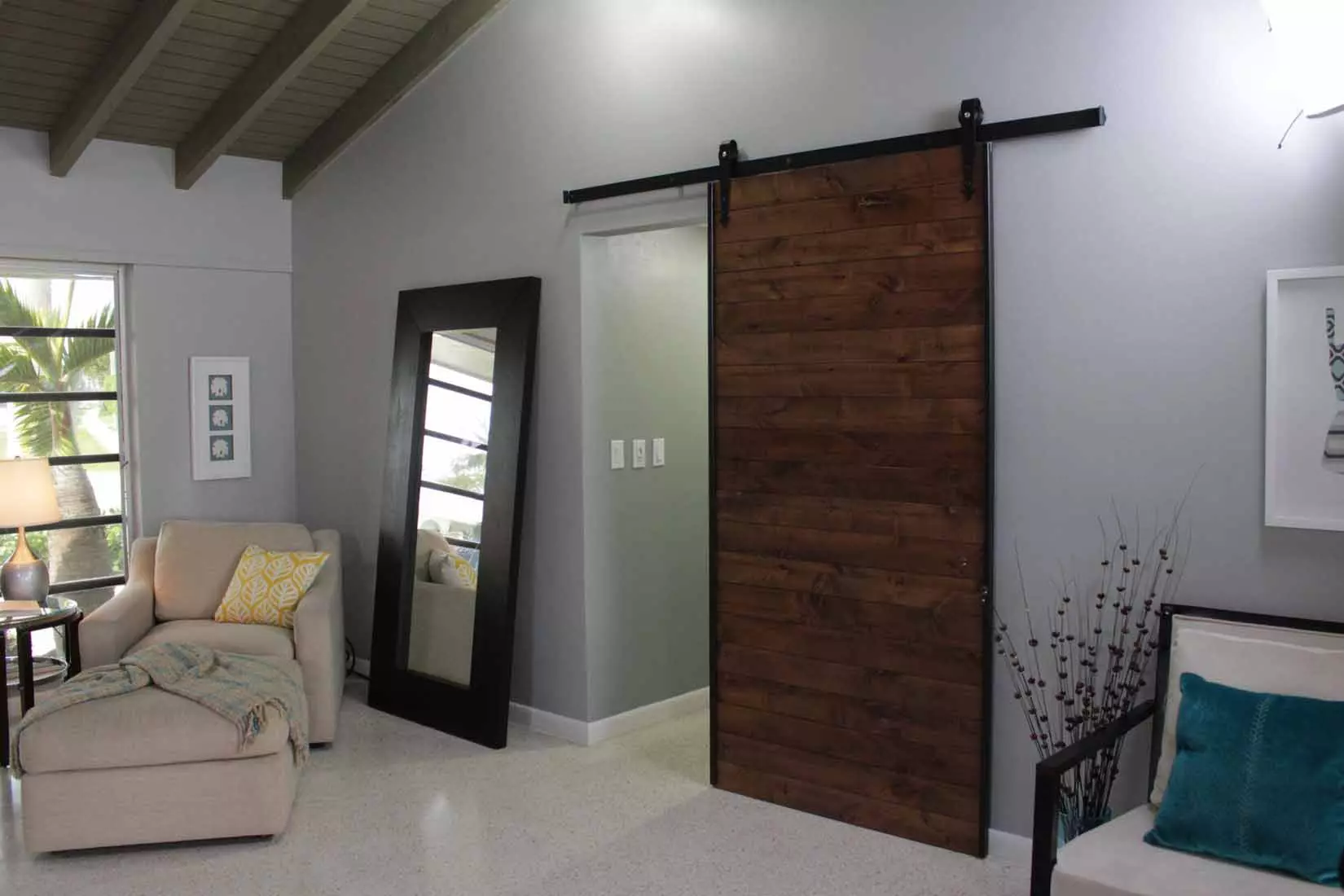 modern living room with wooden door